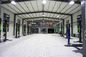ऑटो सर्विस शॉप के लिए स्वच्छ स्पैन लाइट स्टील फ्रेम स्ट्रक्चर वर्कशॉप भवन