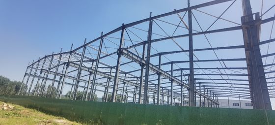 गर्म बिक्री पूर्वनिर्मित इस्पात कार्यशाला भवन धातु जस्ती पोर्टल फ्रेम निर्माण भंडारण