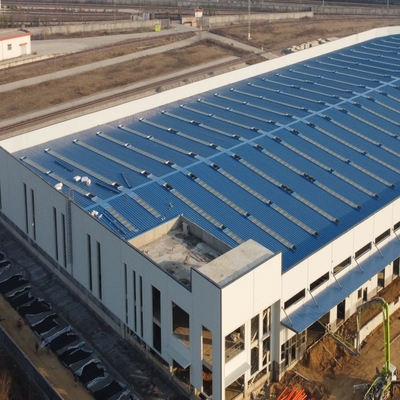 पूर्वनिर्मित इस्पात संरचना गोदाम पोर्टल फ्रेम Q235B Q355B ASTM A36
